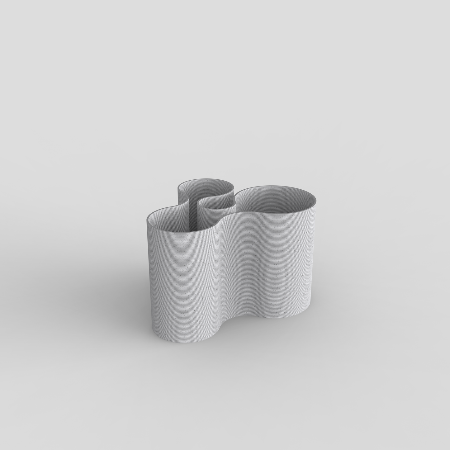 Coral Crest pot in marble, doubling as a pencil holder.