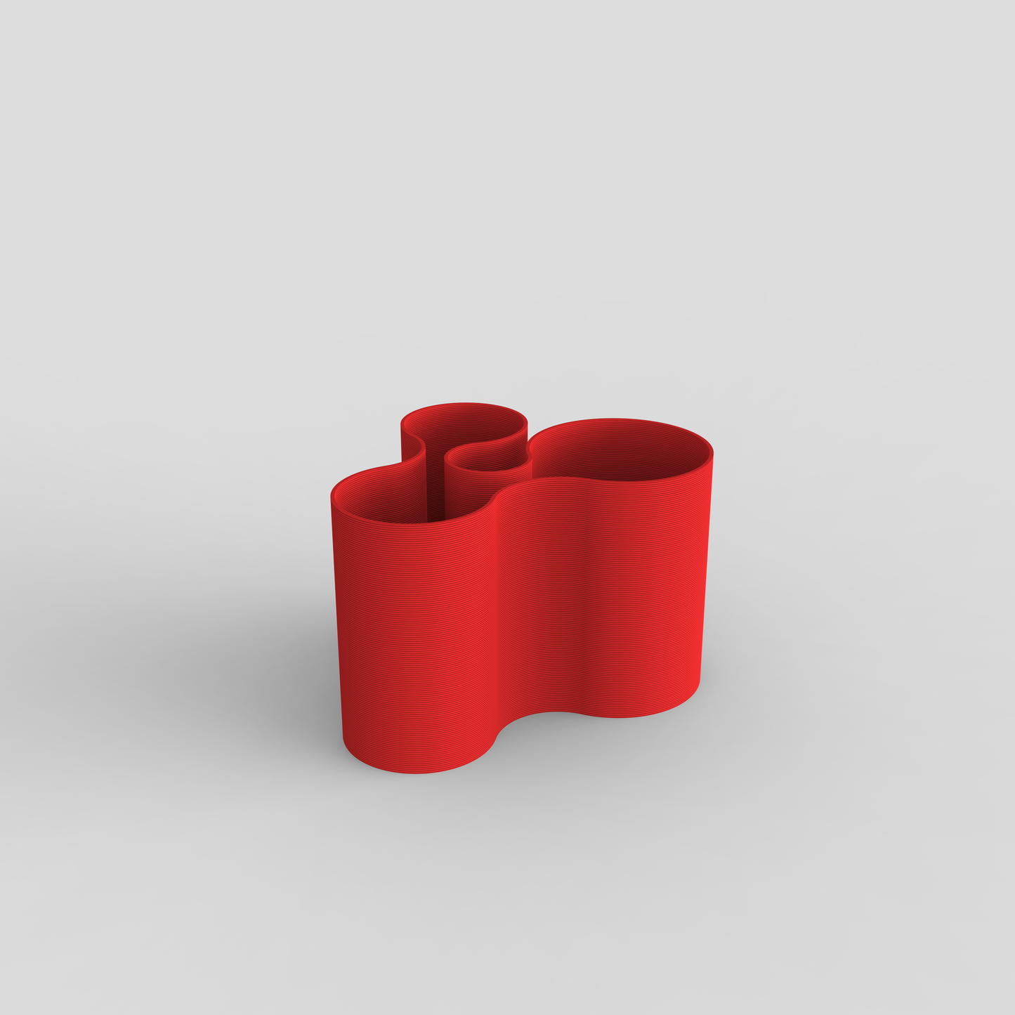 Multi-functional Coral Crest pot in Red, holding plants.