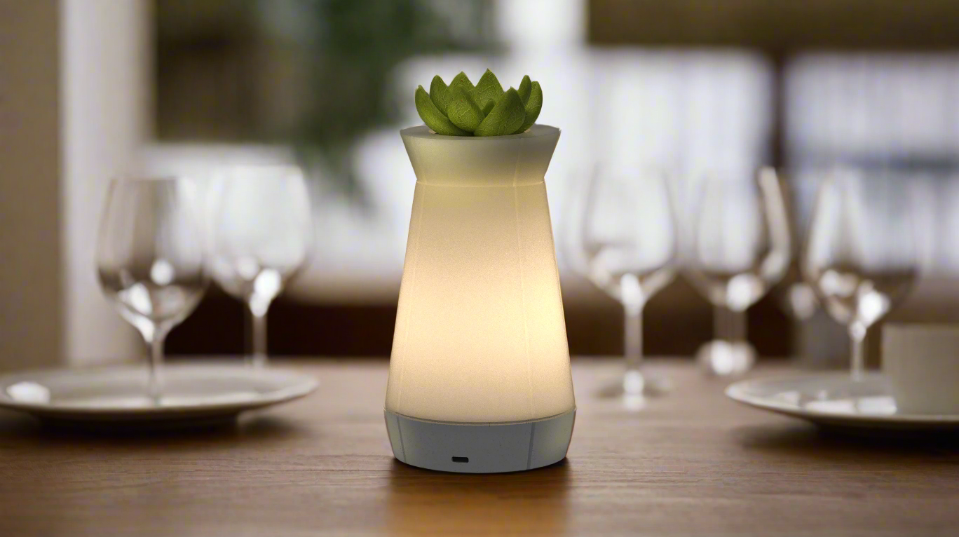 Smart Venti Plus table lamp with a minimalist design and multifunctional top holder.