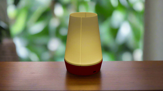 lit venti red on a wooden table