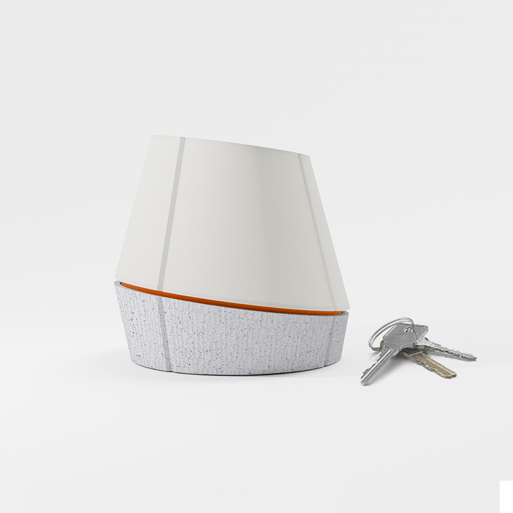 off shot of Litele portable lamp in marble color along with keys