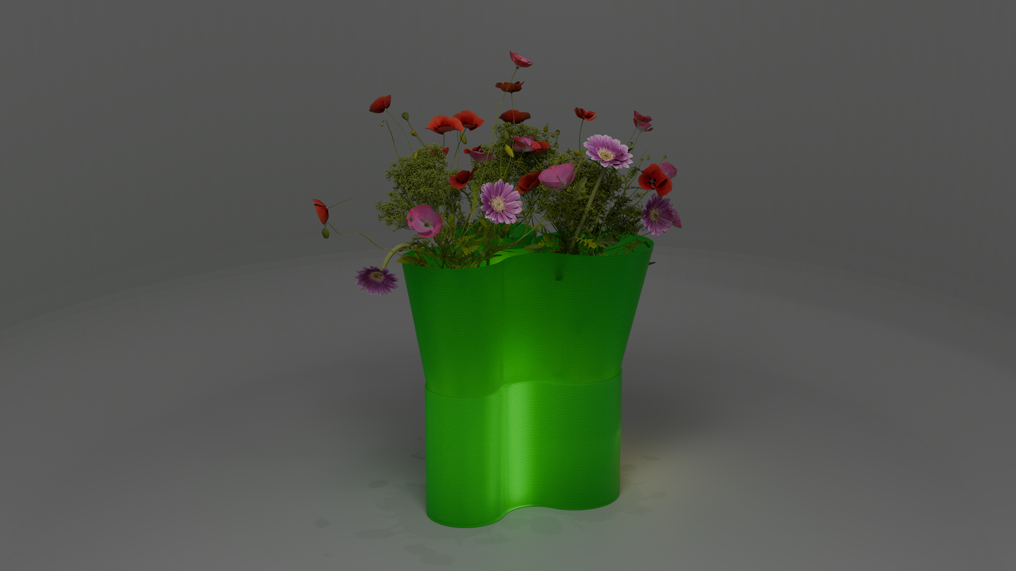 Paso Glo vase, a dual-sectioned green coloured planter with a glowing base, holding red and pink flowers.