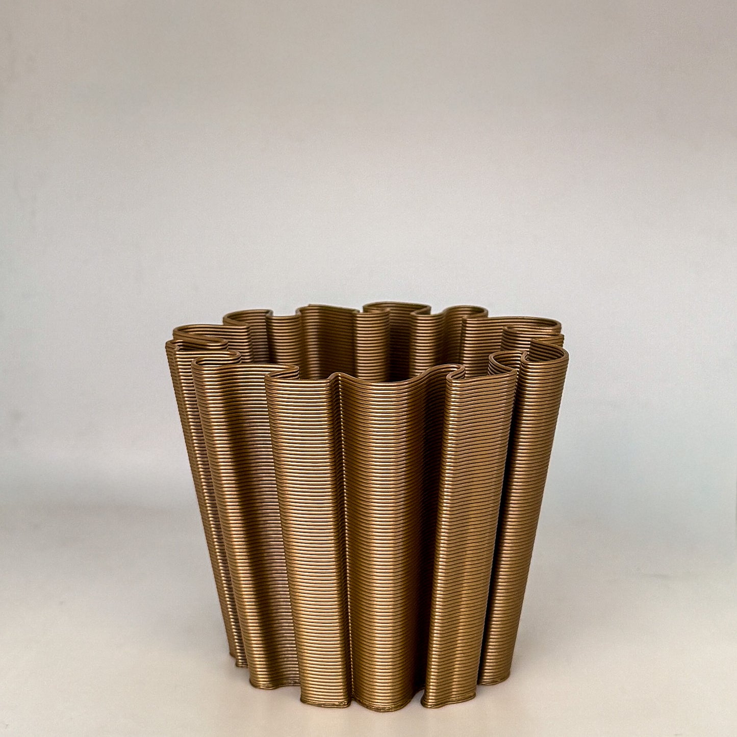 front view of coral vase in bronze color