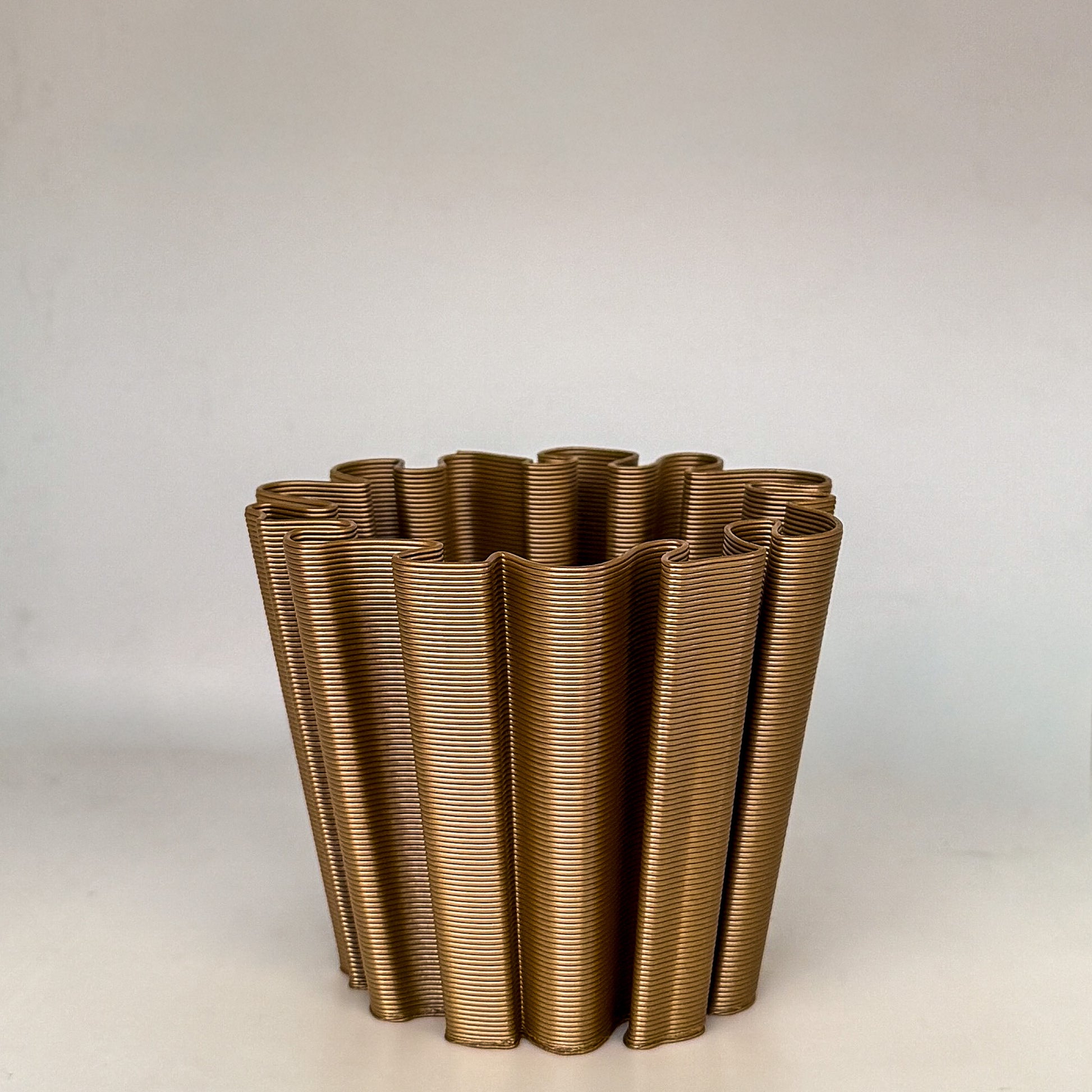 front view of coral vase in bronze color