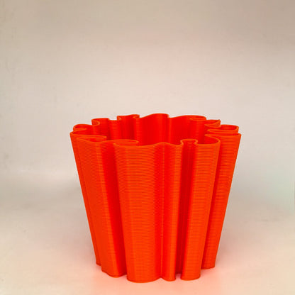 front view of coral vase in orange color