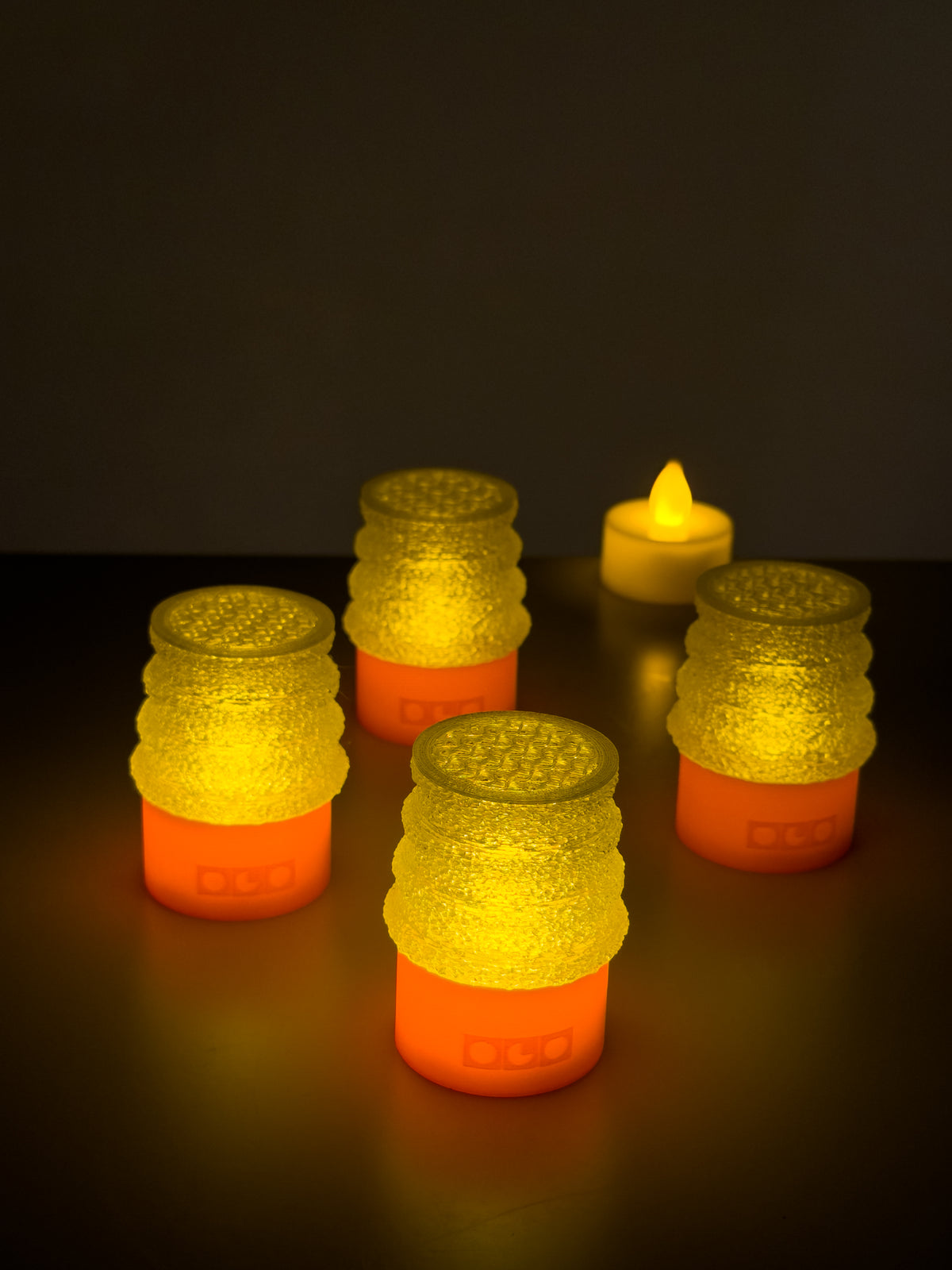 Set of four mini jello lamps with a small candle light behind