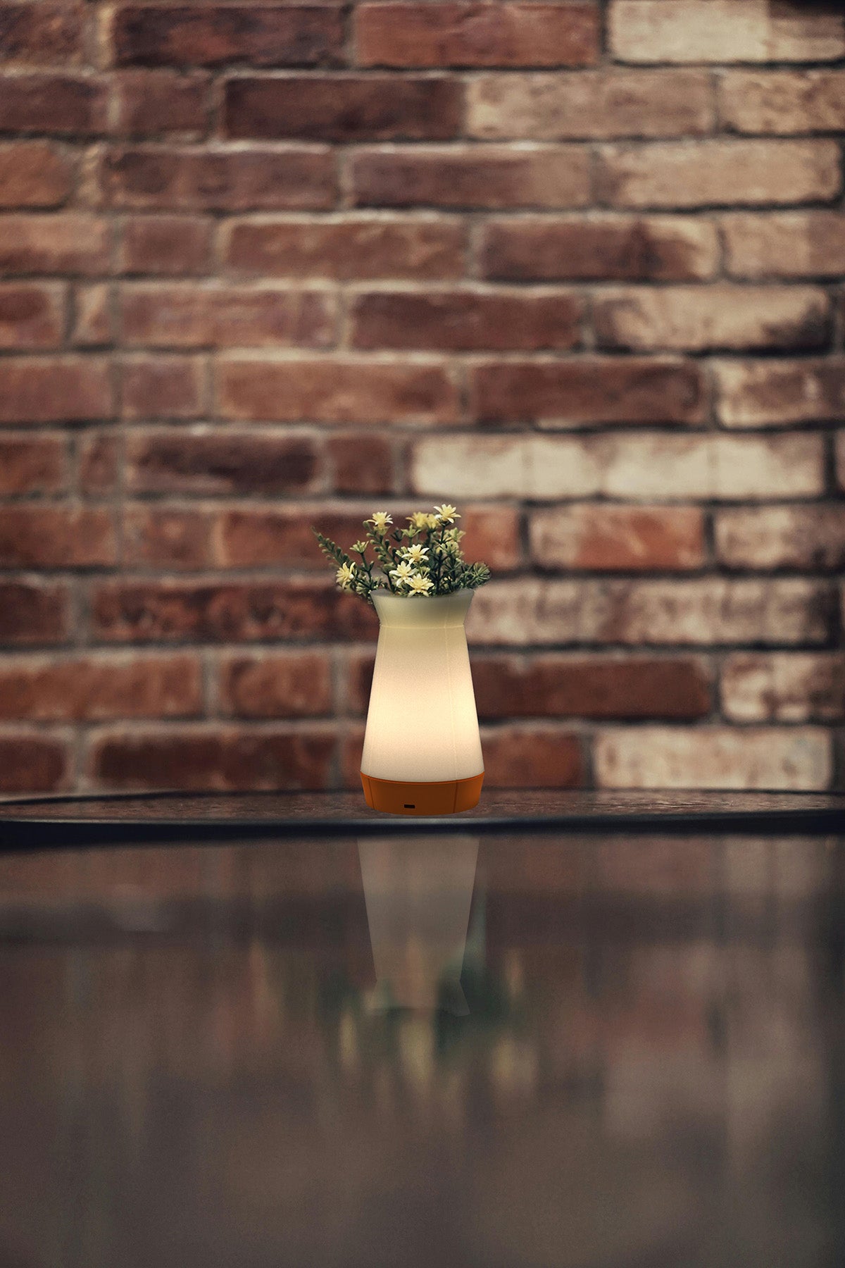 Plain venti plus orange lit beside a wall