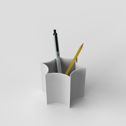 Star Coral Pot on a desk with pens and pencils