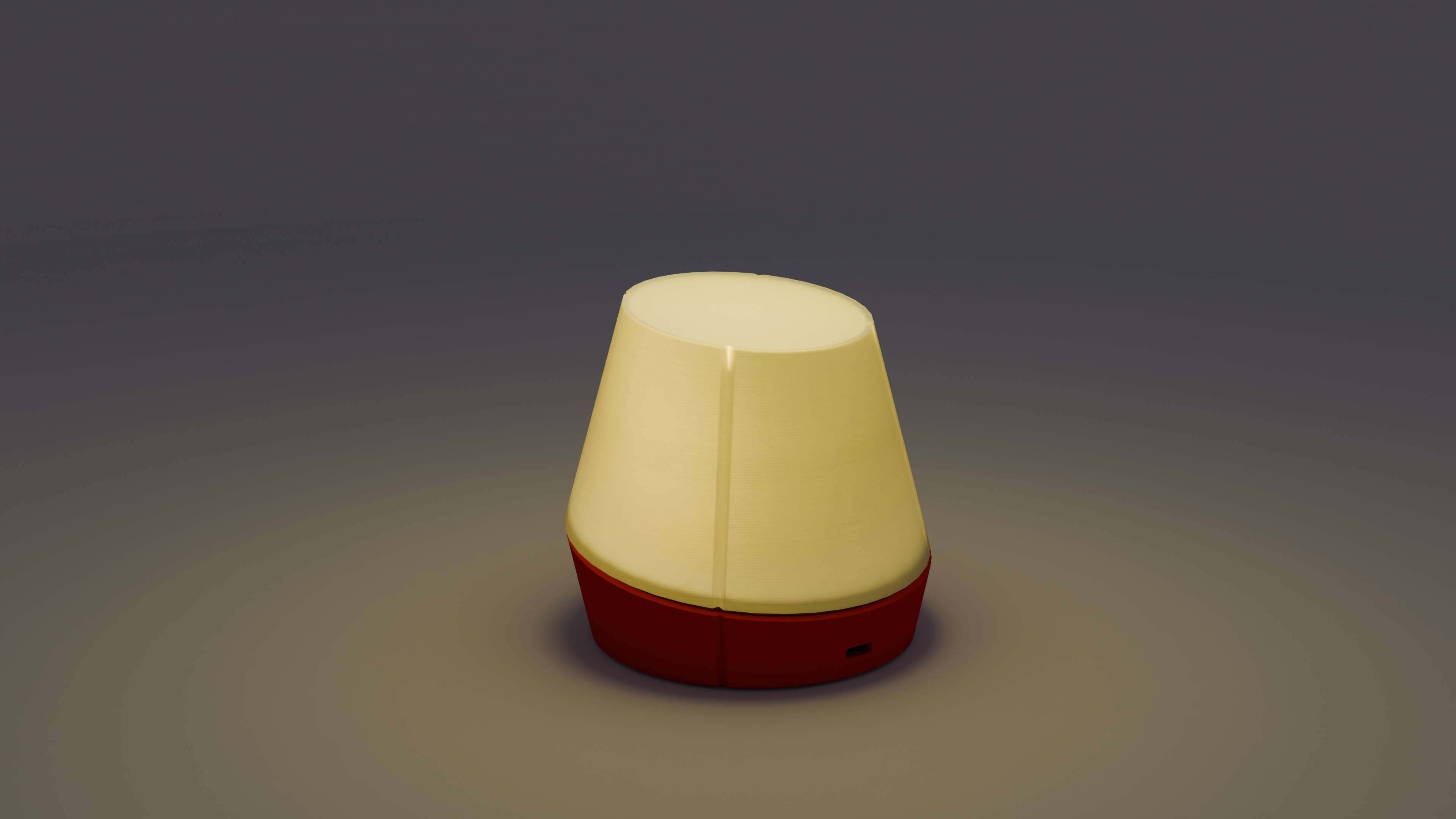 Lit image of litele portable lamp in red colour