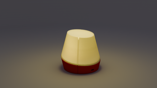 Lit image of litele portable lamp in red colour